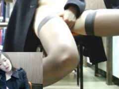 Seductive Japanese lady gets naughty in the library