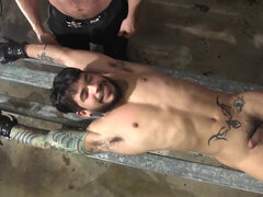Muscular male breaks his partner's ass during rough bondage fetishes