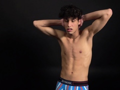 Curly twink boy shows off his slim body on webcam