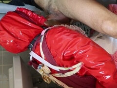 Latex babe Schljuchazulma submits to giving a blowjob in bondage hood