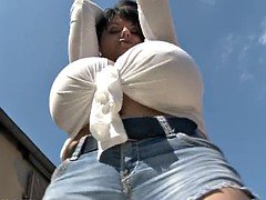 Fat mature washes motorcycle belonging to her son