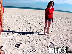 Sexy beach babes strip
