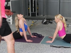 Two lovely girls and two dudes are fucking in the gym