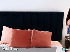 Watch kiki True get her pussy and ass stuffed during phone sex with a big toy