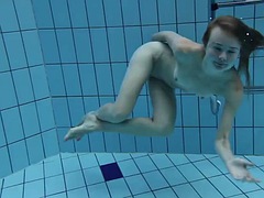 Petite small tits teen Clara underwater