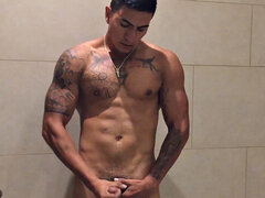 Our featured solo boy of the week is Erick, a muscular and inked young Latino who invites us to watch as he jerks off in the shower.