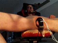 Cumming in chastity with E-stim