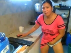 Mature pinay plays with her pussy thru her panties. Nice boobs.