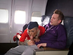 Slender stewardess spins hefty dong like a premium diva