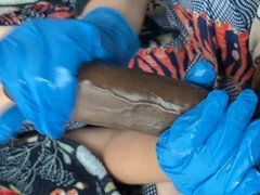 Voluptuous schoolgirl in latex gives a handjob for money to a customer