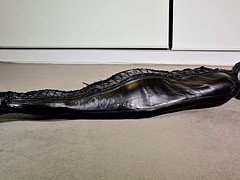 Leather bondage and orgasm