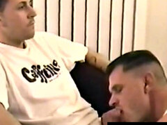 Straight jock gets jerked off while receiving blowjob from DILF