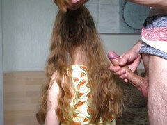 Fetish delight: long-haired beauty gets a cum shower on her silky hair