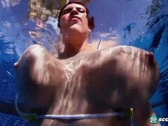 Lovely doll with huge boobs Lana Ivans undressed underwater