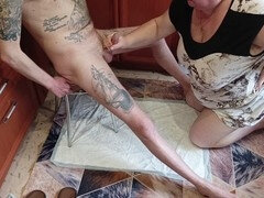 Mature stepmom gives handjob, blows and watches stepson's erection spray