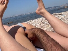 Passionate beach encounter leads to naughty public sex
