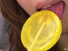 petite Asian in lingerie puts candy on her hairy snatch