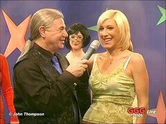 Platinum-blonde John Thompson behind the scenes of a wild gang bang