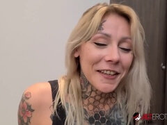Blonde inked babe Nayomi Sharp gives pov blowjob and gags on Sascha's massive cock