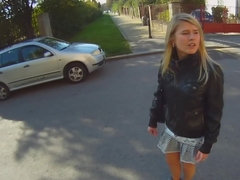 Adorable teenage girl sucking a dick in public