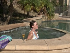 Hairy girl Veronica Snow goes swimming in her pool