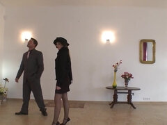 Blondie showing her classy moves with a stylish hat on