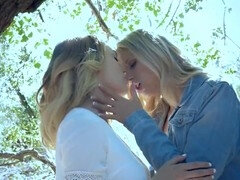 Blonde girls get cozy in the woods and undress each other