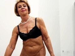 Blonde GILF Romana takes a BBC blowjob in a POV style and finishes with a mouthful