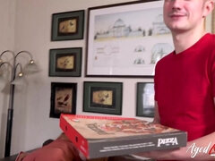 AGEDLOVE The customer pays for the pizza with her slit