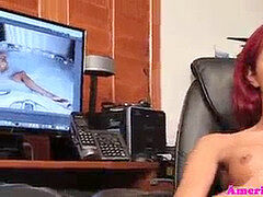 redhead she-creature stroking off at her office