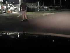 Risky exhib gets naked in front of business