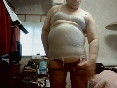 Plump chick from WIENER indulges in some playful tugging and teasing with a small cock