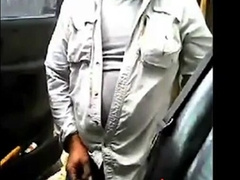 Bearded dad masturbates his shaft by his camper outdoors.