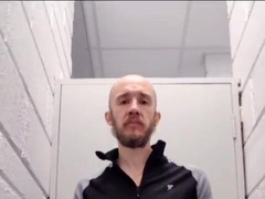 Shaved bearded father milks his sausage