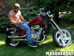 Zack is bearded muscular biker who is jerking off outdoors