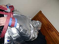 Jun 14 2022 - Rubber Boy gets tied up & breath controlled in silver nylon