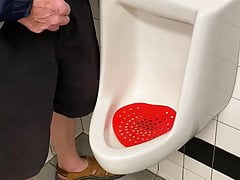 Peeing in public restroom
