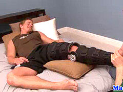 Injured faggot jock gets more than a foot touch