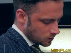 Elevator sex for a pair of businessmen in expensive suits