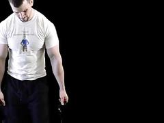 Muscled beefcake is oiling up his incredible body