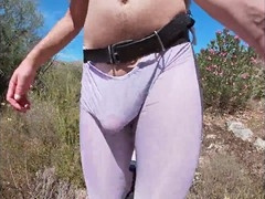 Twink in sexy lingerie teases with bulging boner in public