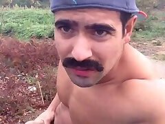 Latino23bom jerks and pees outside