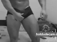 Stud with big cock flexing his muscle
