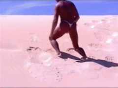 Tanned guy on beach in tiny string thong (temporarily!) 12