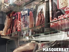 Angelo Godshack wanking his big fat pole in the sex shop