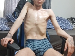 Enormously lean teenage lubricates up his bod and displays his features