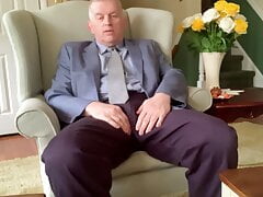 Well dressed 65 year old strips off pants and masturbates