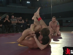 Muscular wrestlers can't handle each other during the round