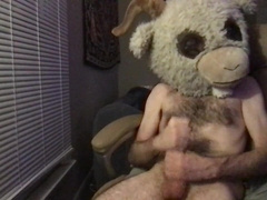 Lean fur covered white guy in a goat mask strokes off in a tabouret