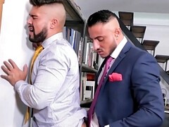 Wearing a suit and having office sex with a tall hunk